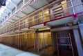 Old prison with rows of cells and bars Royalty Free Stock Photo