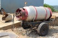 Old propane gas tank on a trailer