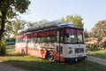 Old public bus with outside reservoirs