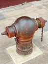 Old public fire hydrant on the footpath Royalty Free Stock Photo