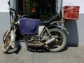 Old Puch motorbike in front of a facade