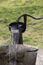 Old pump used to extract water from the field in Turkey. Royalty Free Stock Photo