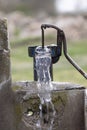 Old pump used to extract water from the field in Turkey. Royalty Free Stock Photo