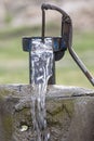 Old pump used to extract water from the field in Turkey. Royalty Free Stock Photo