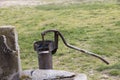 Old pump used to extract water from the field in Turkey. Royalty Free Stock Photo