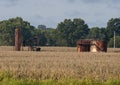 Old pumpjack and oil storage tanks in the State of Oklahoma in the United States of America. Royalty Free Stock Photo