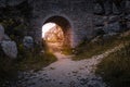 The old quarry bridge with golden sunset shining through at Tout Quarry, Isle of Portland, Weymouth, Dorset