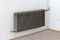 Old radiator in an empty historic home