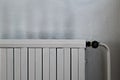Old radiator and stained wall Royalty Free Stock Photo