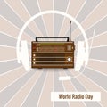 Old radio and headphones silhouette on retro background.