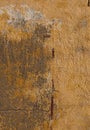Old ragged Painted orange wall Royalty Free Stock Photo