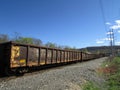 Old rail road cars passing by. Royalty Free Stock Photo