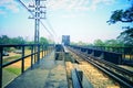 Old railroad tracks on Black Bridge or Lampang Railway Bridge. Railway bridge on river at Lampang thailand Royalty Free Stock Photo