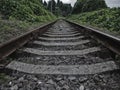 Old rails in the landscape with railroad railway leading lines