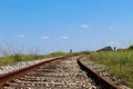 Old railway with blue sky and clouds Royalty Free Stock Photo
