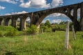 Old railway bridge, old viaduct Vorohta, Ukraine. Carpathian Mountains, wild mountain landscape Royalty Free Stock Photo