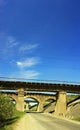 Old railway bridge over the road Royalty Free Stock Photo