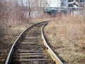 Old railway track at an industrial enterprise Royalty Free Stock Photo