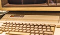 Old rainbow Apple logo on old Macintosh computer