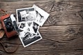 Old rangefinder camera and black-and-white photos.