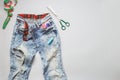 Old raped jeans with and sewing tools top view Royalty Free Stock Photo