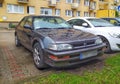 Old rare black Honda Concerto parked in rain Royalty Free Stock Photo