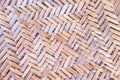 Old rattan mat texture with woven patterns abstract brown background Royalty Free Stock Photo