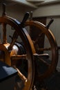 Helm steering wheel old boat ship real art photography light shadow Royalty Free Stock Photo