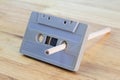 Old realistic cassette tape on wood table Royalty Free Stock Photo
