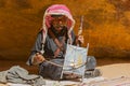 Old Rebab Bedouin player with his self made instrument singing in the Petra desert Jordan.