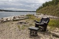 Old recliner by the lake