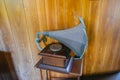 An old record player. An old gramophone with a retro plate that produces pleasant sounds or music. Stereo system