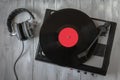 Old record player for vinyl records and headphones Royalty Free Stock Photo