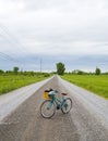 Old recreational bike in the middle of a gravel road