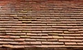 Old rectangular red ceramic tiles on the roof. Background image, texture Royalty Free Stock Photo