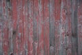 Old worn off red painted barn boards