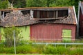 Old red barn with a collapsed roof.. Royalty Free Stock Photo