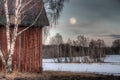 Old red barn in a countryside landscape