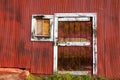 Old red barn door framed in white Royalty Free Stock Photo