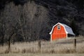 Old Barn in Field in Late Fall Autumn Brown Grass No Leaves