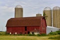 Red Barn and Silos on Summer Day Royalty Free Stock Photo