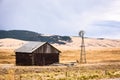 An old red barn and weathervane in Colorado