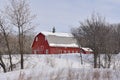 Old red barn in the winter Royalty Free Stock Photo