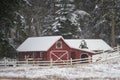 An old red barn in a winter wonderland Royalty Free Stock Photo