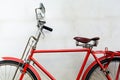 Old Red Bicycle and old cement wall Royalty Free Stock Photo