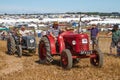 Old red and blue vintage tractor at show Royalty Free Stock Photo