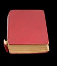 Old red book on a black background Royalty Free Stock Photo
