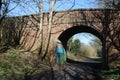 Old red brick bridge over disused railway line Royalty Free Stock Photo