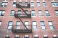 Old red brick building with iron fire escape, New York City, USA Royalty Free Stock Photo