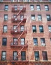 Old red brick building with iron fire escapes, New York City, USA Royalty Free Stock Photo